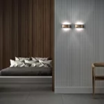 Minimalistisk Light-Point Aura væglampe, der skaber en stemningsfuld og elegant belysning.