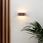 Light-Point Aura væglampe med blød, cirkulær lysfordeling og et moderne, tidløst udtryk.